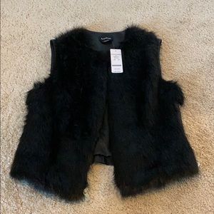 Bebe faux fur vest, never worn!